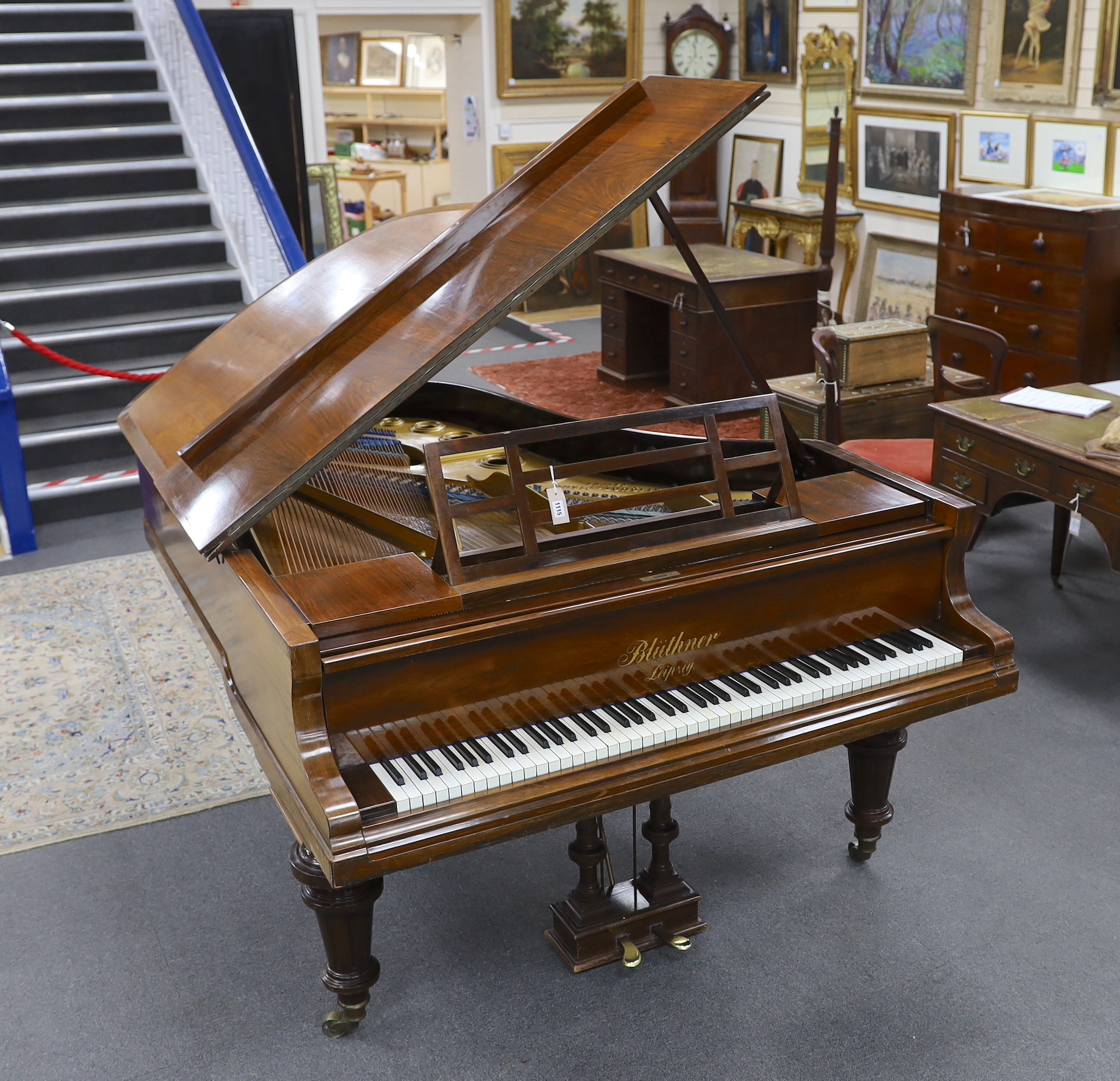 An early 20th century Blüthner rosewood and simulated rosewood Alquot Patent grand piano, Serial No. 72354, width 146cm, length 188cm